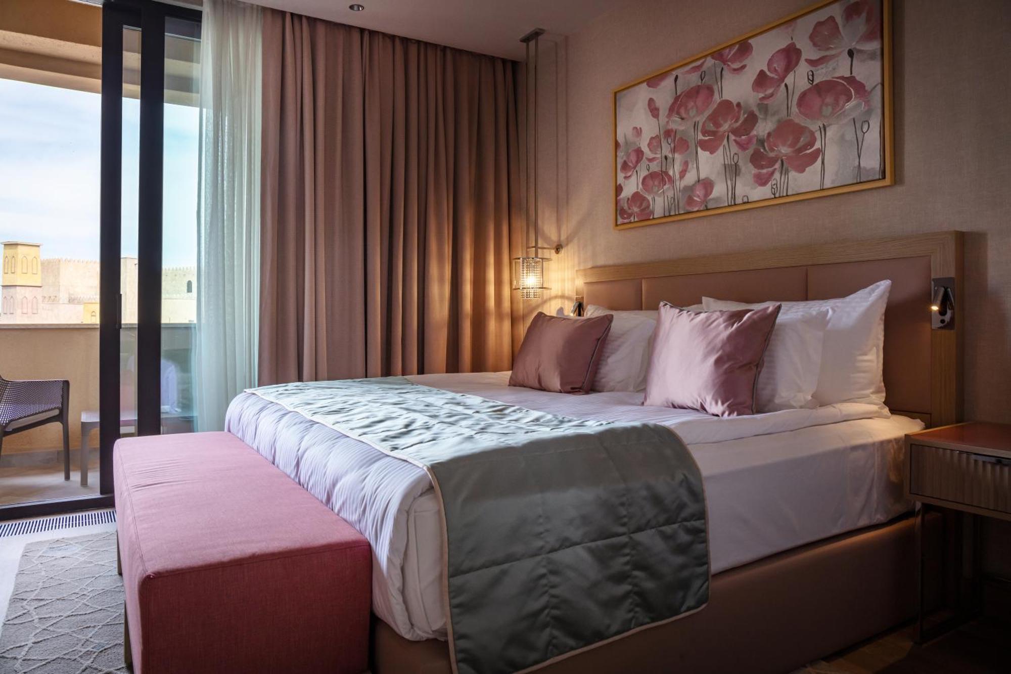 Karavansaray Turkistan Harbour Hotel -Flying Theatre Access المظهر الخارجي الصورة A bedroom at the hotel
